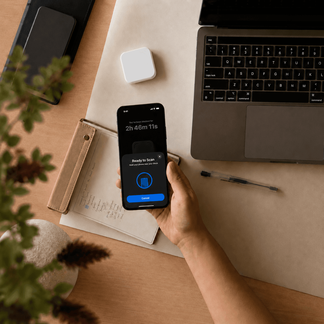 Slate app screen prompting you to tap your phone to a block to unlock